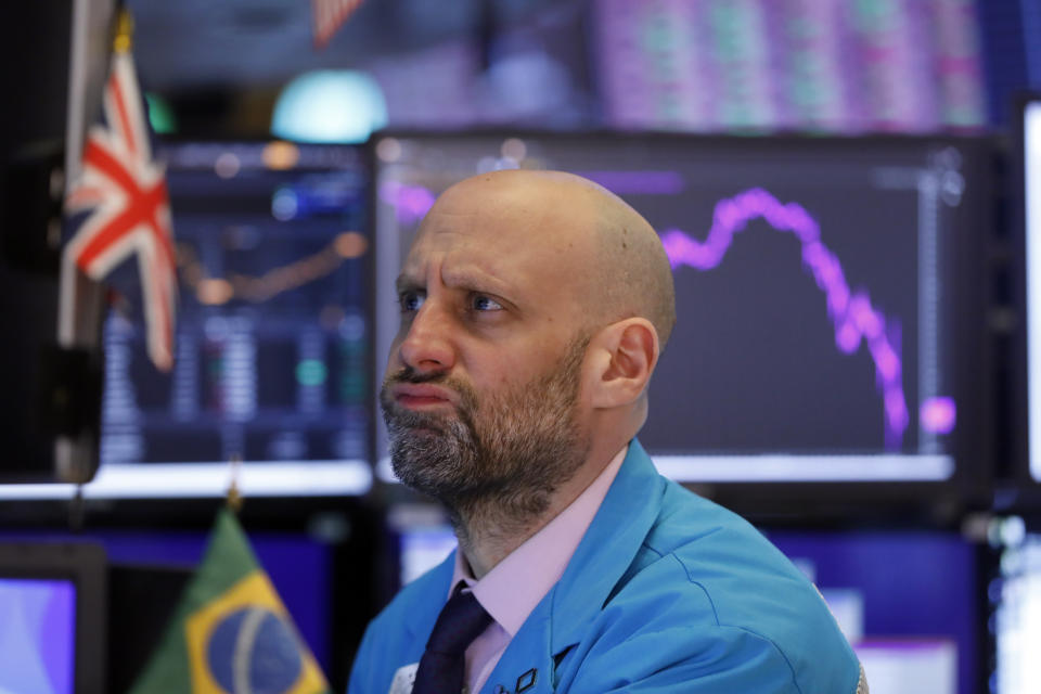 Specialist Meric Greenbaum works at his post on the floor of the New York Stock Exchange, Monday, March 9, 2020. The Dow Jones Industrial Average sank 7.8%, its steepest drop since the financial crisis of 2008, as a free-fall in oil prices and worsening fears of fallout from the spreading coronavirus outbreak seize markets. (AP Photo/Richard Drew)