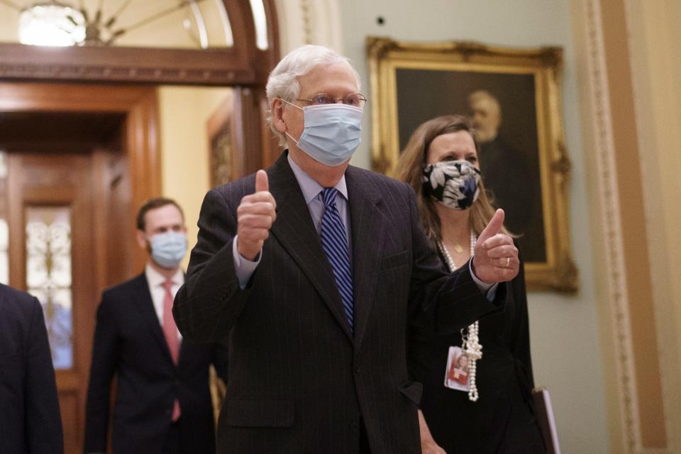 Senate Majority Leader Mitch McConnell, R-Ky., leaves the chamber after final roll call vote to put Amy Coney Barrett on the Supreme Court, at the Capitol in Washington, Monday, Oct. 26, 2020. (AP Photo/J. Scott Applewhite)