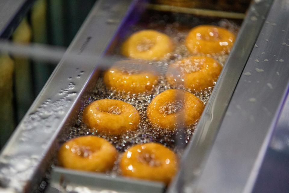 Doughnuts cook in the fryer Monday, June 27, 2022, at Diamond Dough and Co. in Cassopolis.
