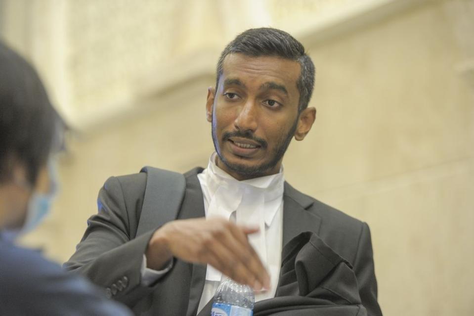 Lawyer Surendra Ananth speaks to reporters at the Palace of Justice in Putrajaya September 22, 2020. — Picture by Shafwan Zaidon