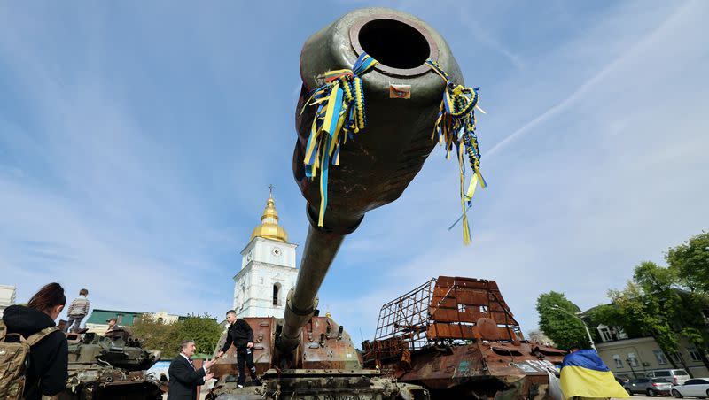 People come to look at an exhibition displaying destroyed Russian military vehicles in central Kyiv, Ukraine, on Wednesday, May 3, 2023. A group of Utah officials recently traveled to the country.