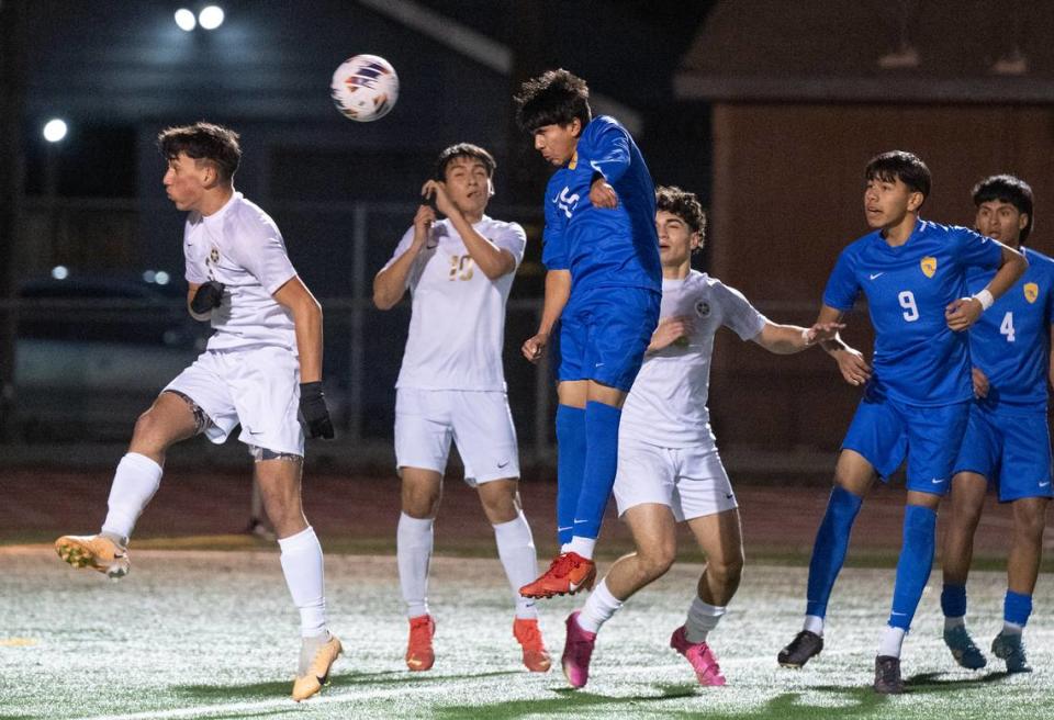 Turlock’s Antonio Jimenez heads the ball at the goal during the Central California Athletic League game with Enochs at Turlock High School in Turlock, Calif., Wednesday, Jan. 24, 2024.