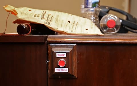 A piece of furniture with an attached 'PANIC' button sits in the Roosevelt Room during rennovation work at the White House August 11, 2017 in Washington, DC - Credit: Getty