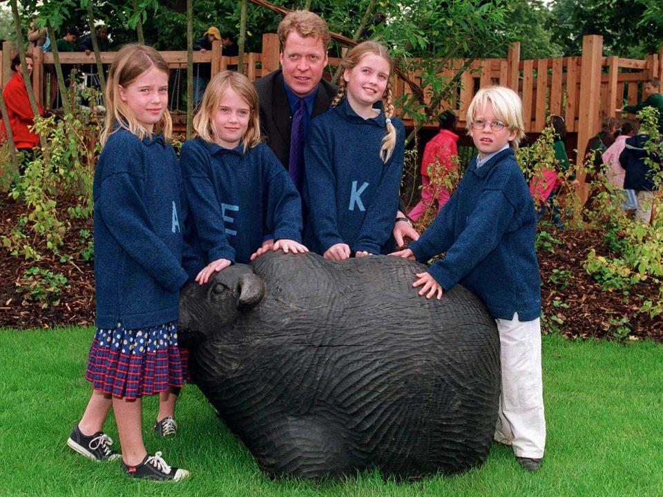 Charles Spencer with his children Amelia, Eliza, Kitty, and Louis in June, 2000.