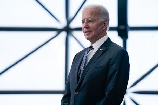 PHOTO: President Joe Biden listens as Ambassador Caroline Kennedy speaks before Biden about the cancer moonshot initiative at the John F. Kennedy Library and Museum in Boston, Sept. 12, 2022. (Evan Vucci/AP)