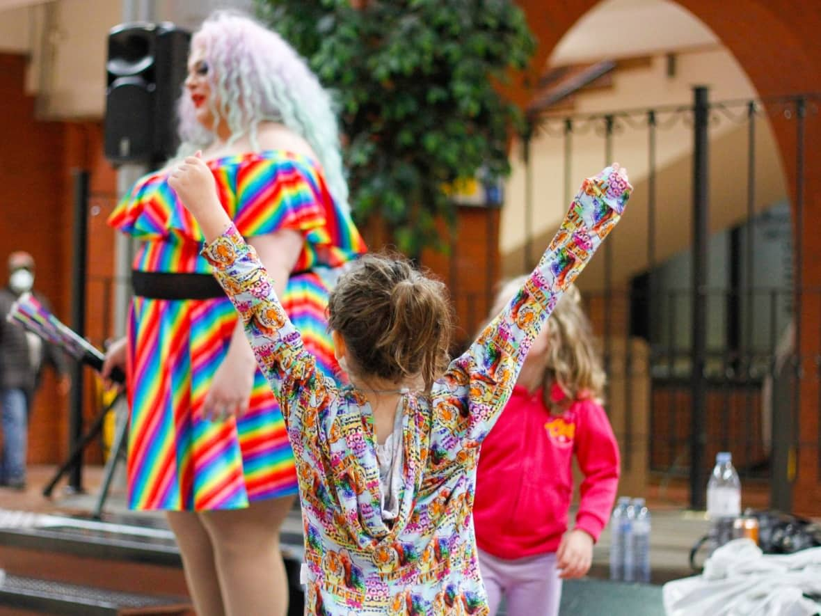 A drag story event at the Saint John Free Public Library, featuring Shawn Craft performing as Dia Monde, was among several similar events at libraries across Canada to be targeted this month by online hate. (Supplied by Blair Richardson - image credit)