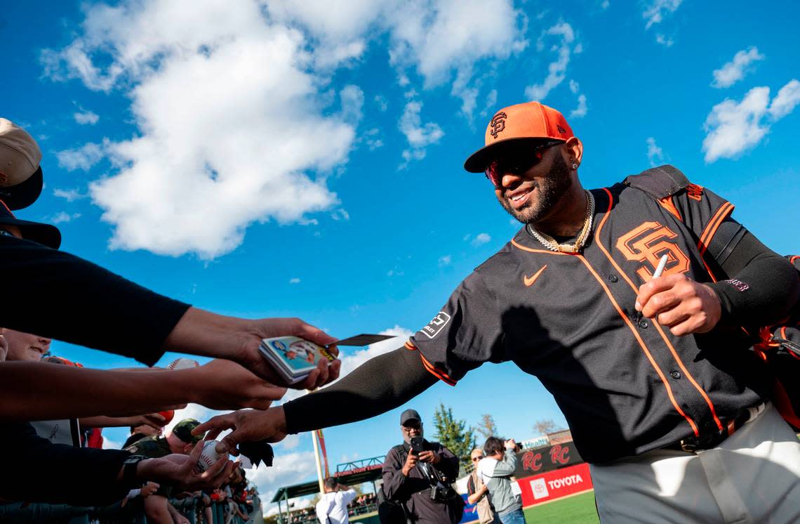 Pablo Sandoval signs autographs for fans as the San Francisco Giants played the Sacramento River Cats in an exhibition game Sunday at Sutter Health Park.