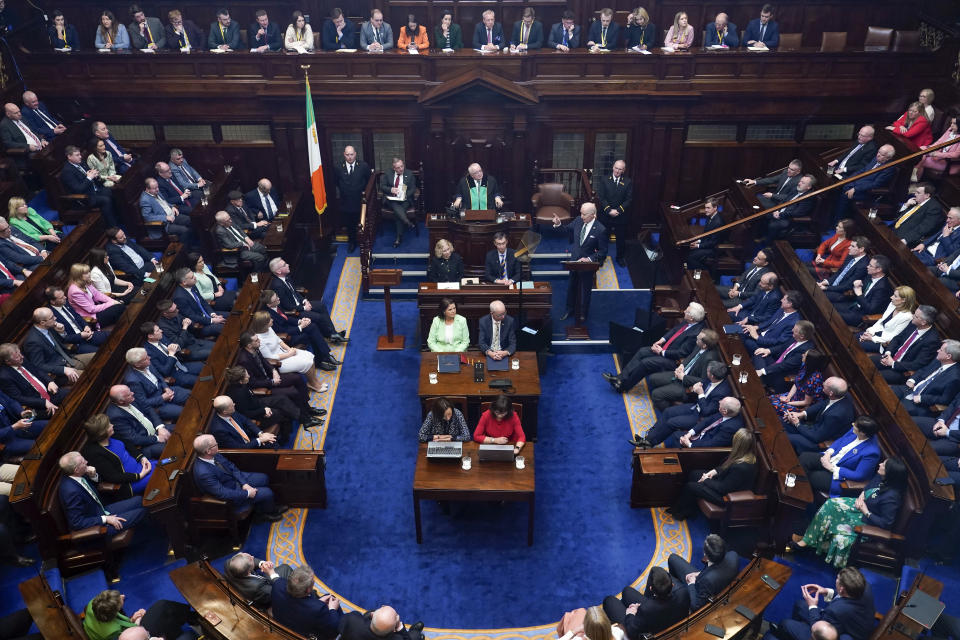 President Joe Biden addresses members of the Irish parliament at Leinster House in Dublin, Thursday, April 13, 2023. (AP Photo/Patrick Semansky)