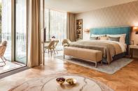 <p><span>Hamburg's first five star hotel to open in 18 years will welcome guests from the summer. The </span><a rel="nofollow noopener" href="http://www.thefontenay.de/" target="_blank" data-ylk="slk:131-room lakeside retreat;elm:context_link;itc:0;sec:content-canvas" class="link "><span>131-room lakeside retreat</span></a><span> will have sculpture-like architecture and contemporary design, and all rooms will feature floor-to-ceiling windows and balconies overlooking the lake. Food is good - with one of the two restaurants headed by a Michelin-starred chef. [Photo: The Fontenay]</span> </p>