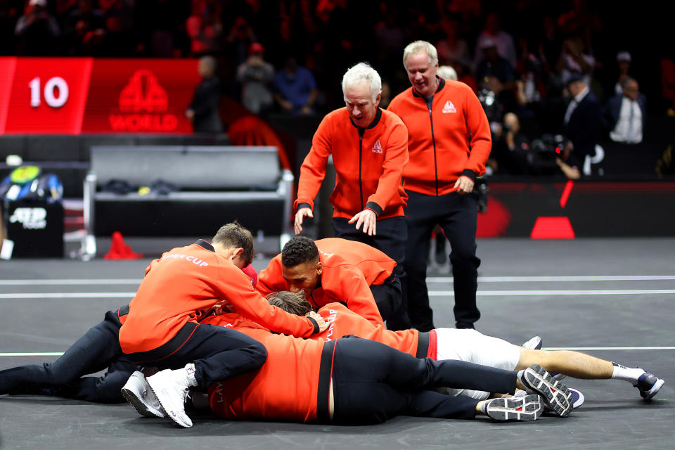 Frances Tiafoe, pictured here being mobbed by teammates after winning the Laver Cup for Team World.