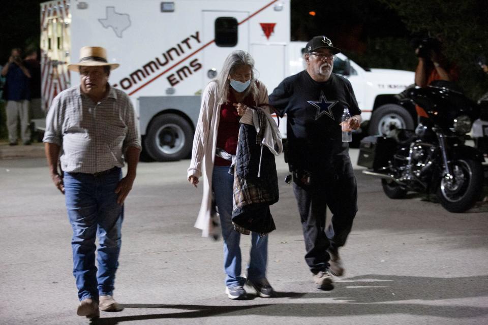 People leave the Civic Center after a mass shooting at Robb Elementary School in Uvalde, Texas, U.S., May 24, 2022.