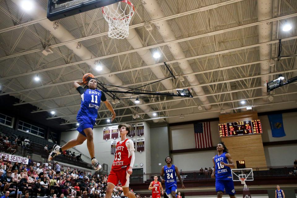 Memorial's Ty Frierson goes up for a basket during the All-State basketball game at Jenks High School on Thursday, July 28, 2022.