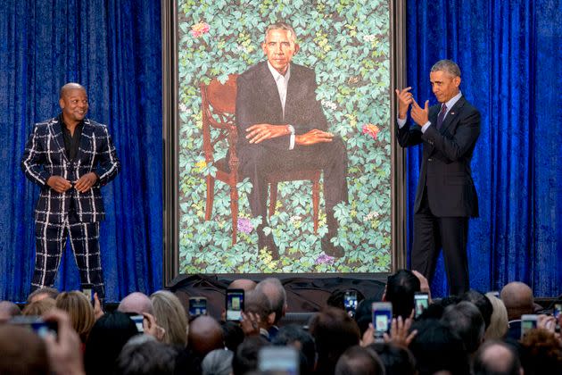 Former President Barack Obama and Artist Kehinde Wiley unveil Obama's official portrait on Feb. 12, 2018, at the Smithsonian's National Portrait Gallery in Washington.