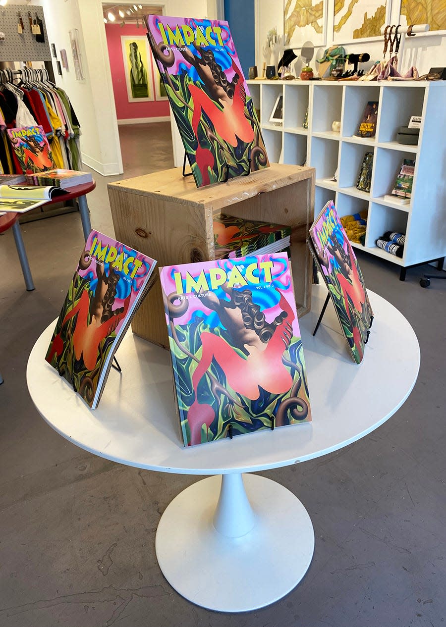 IMPACT Vol. 2 No. 2 with cover art by Ben Tollefson occupies a table at the center of The Sulfur Shop.