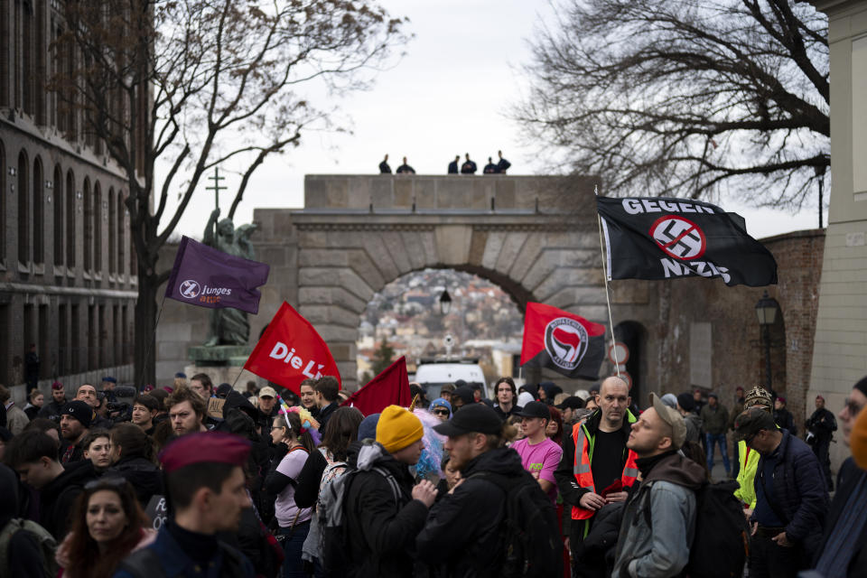 Hundreds of antifascist activists gather in Hungary's capital on Saturday to oppose an annual commemoration held by far-right groups in Budapest, Saturday, Feb. 10, 2024. (AP Photo/Denes Erdos)