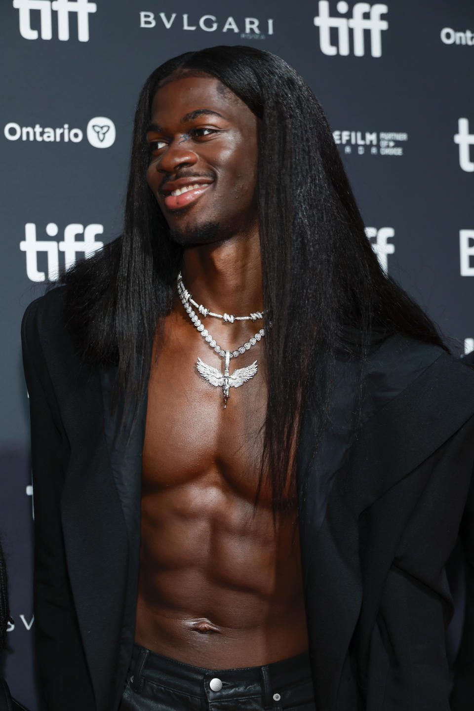 Lil Nas X With Black Jacket And Long Hair