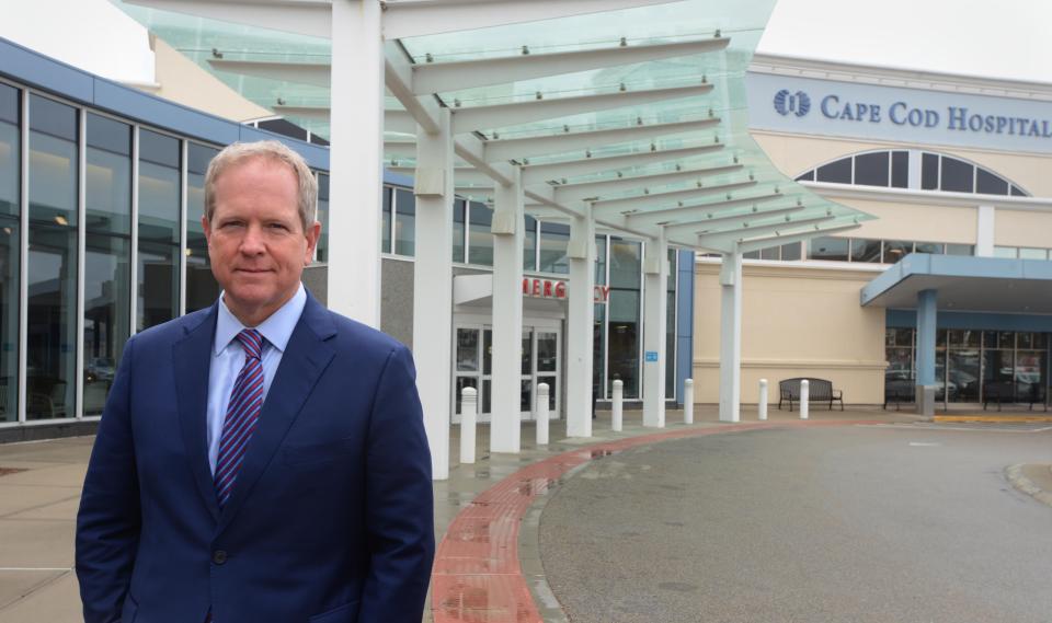 Michael Lauf, president and CEO of Cape Cod Healthcare, stands outside the main entrance to Cape Cod Hospital in Hyannis.