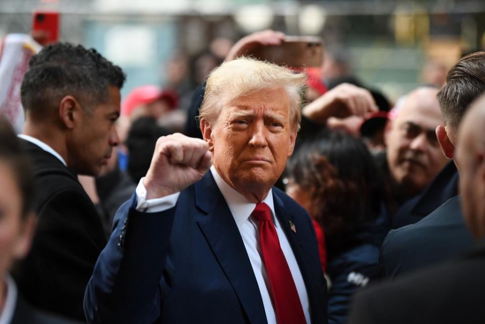 Donald Trump reacts to supporters at the site. Matthew McDermott