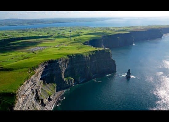 In County Clare, the time-honored <a href="http://www.cliffsofmoher.ie/" target="_hplink">Cliff’s of Moher</a>’s loom as the most visited natural wonder. Now a brand new coastal way path can take the experienced walker as many as seven miles from Liscannor Village to the south, up 700 feet along the jaw-dropping cliffs, past the visitors center, and back down to Doolin. Up in Northern Ireland, give yourself a long morning to stroll and stare in wonder (and you will) at the naturally-formed 40,000 interlocking, hexagonal columns of volcanic basalt leading down into the sea at <a href="https://www.nationaltrust.org.uk/giants-causeway/" target="_hplink">Giant’s Causeway</a>, a World Heritage Site very near Bushmills, in County Antrim. A shuttle to the shore is available, where you can walk a stretch long enough that the light changes the color of the landscape and you can watch the smashing North Atlantic tide wash out to Scotland’s Mull of Kintyre. Pause here to ponder the tale of Irish giant Finn MacCool who, legend has it, created the causeway to reach his Scottish rival Banandonner across the sea. Climb across the <a href="http://www.nationaltrust.org.uk/carrick-a-rede/" target="_hplink">Carrick-a-Rede Rope Bridge</a>, if you dare. It’s very nearby along the Causeway Coast.