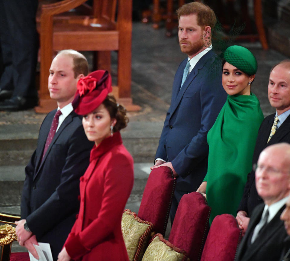 William and Kate standing in front of Harry and Meghan