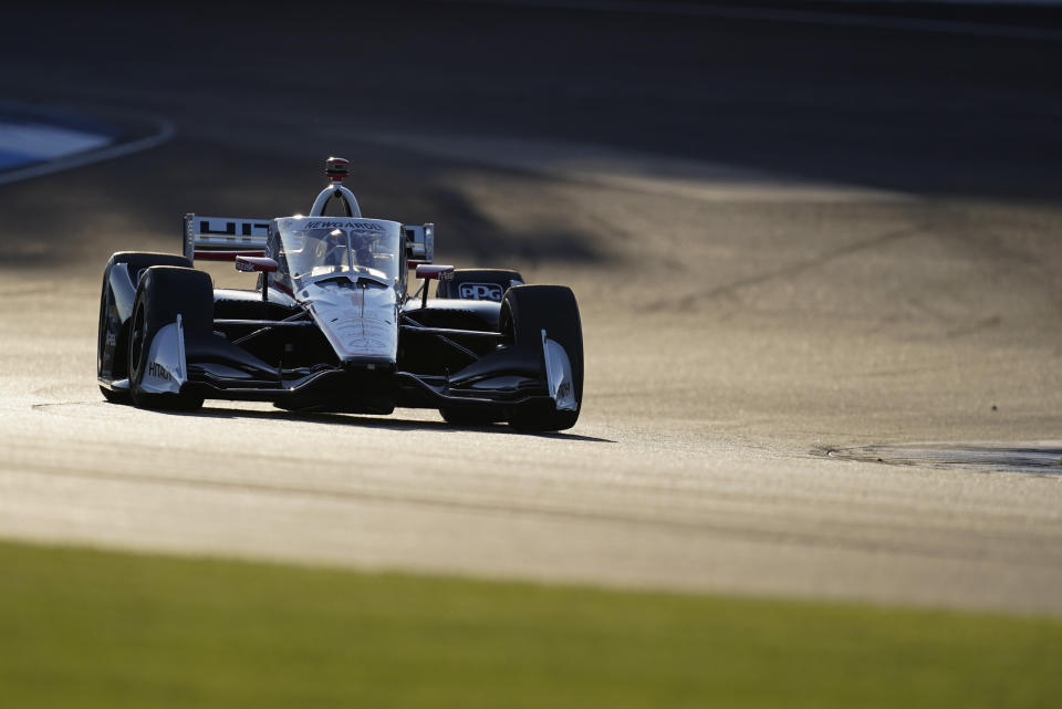 Josef Newgarden drives during qualifying for the IndyCar auto race at Indianapolis Motor Speedway, Thursday, Oct. 1, 2020, in Indianapolis. (AP Photo/Darron Cummings)