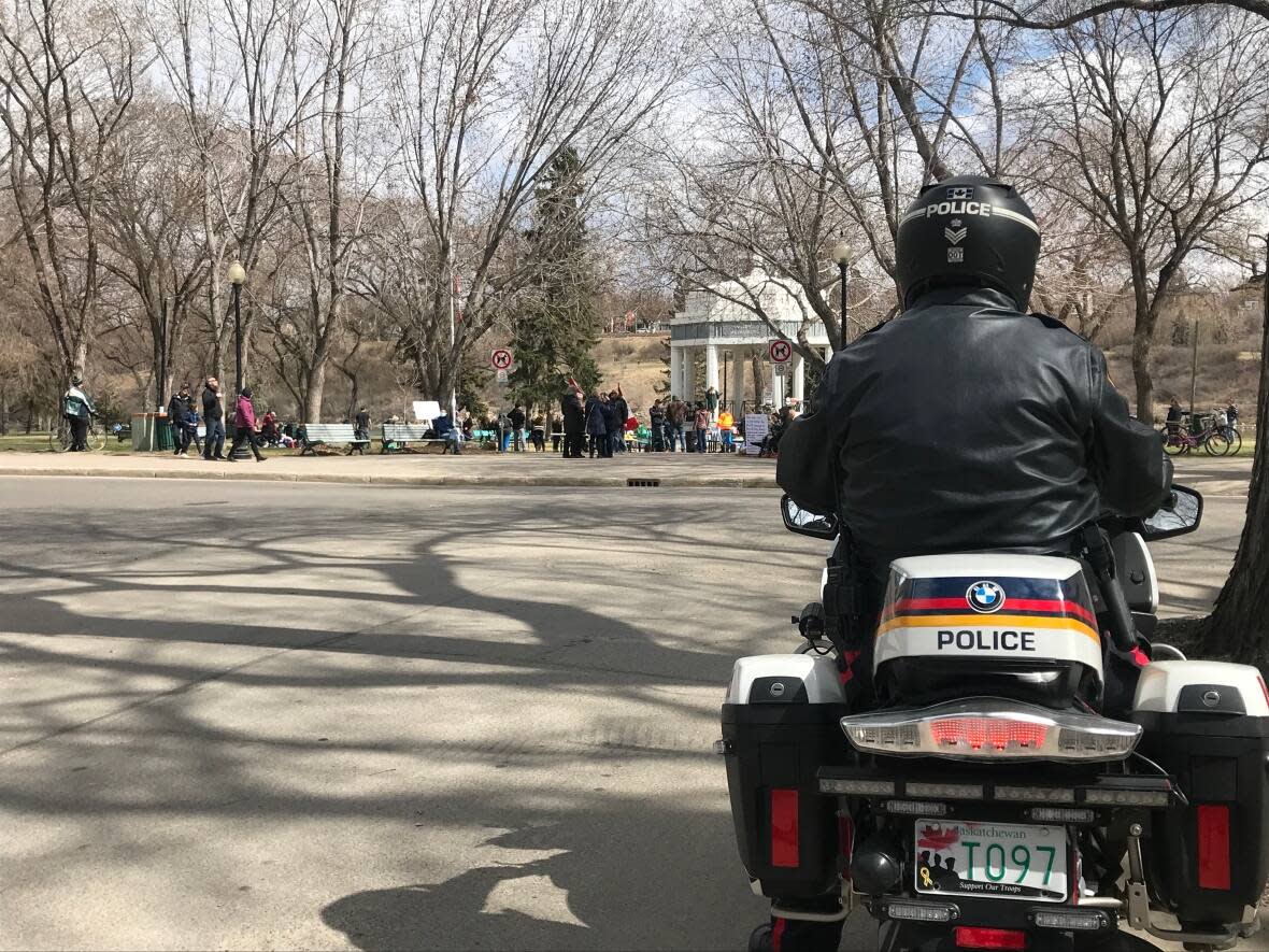 Police in Saskatoon monitored a protest against COVID-19 restrictions in April 2021. (Leisha Grebinski/CBC - image credit)