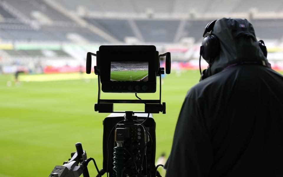 TV Camera football pitch - Shutterstock/Alex Pantling