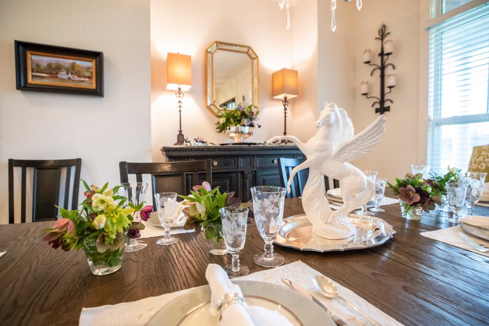 A pegasus centerpiece on the dining room table in Kim Smith's home in a North Oldham neighborhood of Kentucky. April 21, 2022