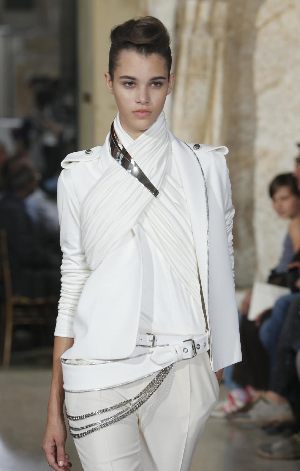 A model wears a creation by fashion designer Bouchra Jarrar during the Women's Fall Winter 2013-2014 haute couture fashion collection presented at Antoine Bourdelle Museum in Paris Tuesday, July 2, 2013 in Paris. (AP Photo/Jacques Brinon)