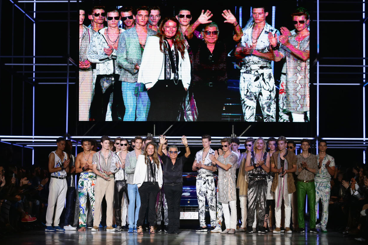 Designer Roberto Cavalli  acknowledges the applause of the public after the Roberto Cavalli show as part of Milan Fashion Week Menswear Spring/Summer 2015  on June 24, 2014 in Milan, Italy. / Credit: Vittorio Zunino Celotto / Getty Images