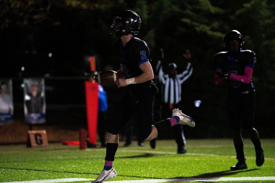 Summit Country Day quarterback Alex Davis (2) scores a touchdown in the second quarter of the Miami Valley Conference football game between Roger Bacon and the Knights at Summit Country Day in Hyde Park on Friday, Oct. 14.