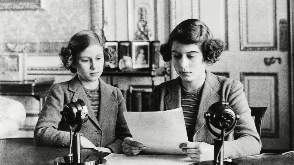 British Royal Family. Future Countess of Snowdon Princess Margaret and Future Queen of England Princess Elizabeth, preparing for a radio address, circa early 1940s.