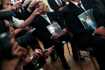 Members of the media work next to family members of people abducted by North Korea, during their meeting with U.S. President Donald Trump at Akasaka Palace in Tokyo, Japan May 27, 2019. REUTERS/Jonathan Ernst