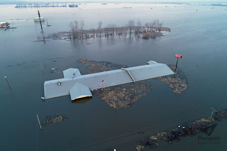 The roof of the Bluff View Motel is seen during the flooding of the Missouri River near Glenwood, Iowa, U.S. March 18, 2019. Passport Aerial Photography/Handout via REUTERS.