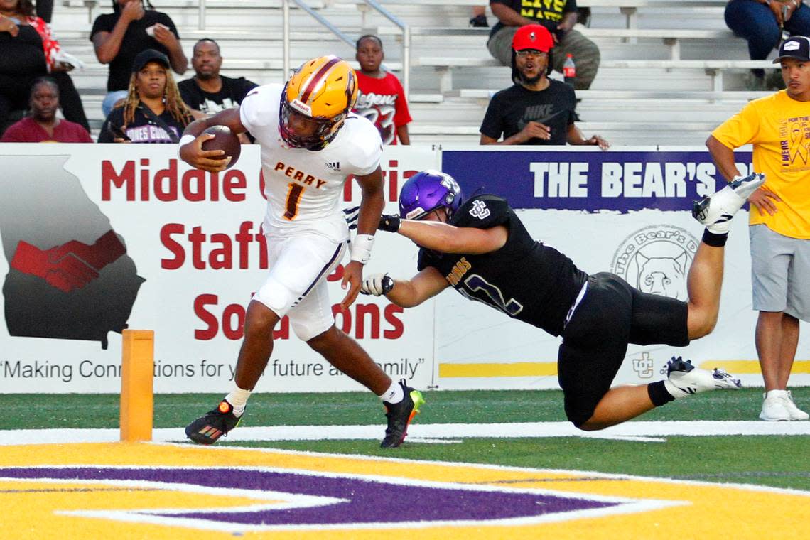 Perry’s Amar Gordon Jr. (1) picked up a fumble and ran the ball into the end zone for Perry’s second touchdown of the first quarter during the Panthers’ 42-14 win over Jones County Friday night.