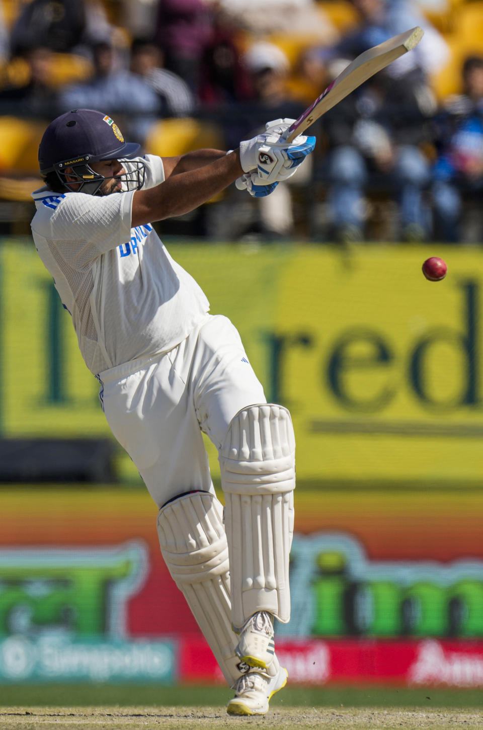 India's captain Rohit Sharma bats on the second day of the fifth and final test match between England and India in Dharamshala, India, Friday, March 8, 2024. (AP Photo/Ashwini Bhatia)