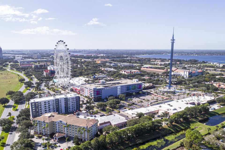 Florida, aerial view of The Wheel at ICON Park, Orlando Star flyer swing, amusement park ride (Jeff Greenberg / UIG via Getty file)