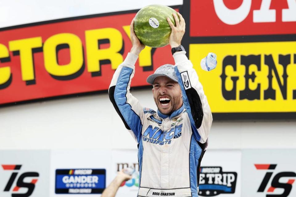 Ross Chastain celebrates in Victory Lane after winning a NASCAR Truck Series auto race, Sunday, June 16, 2019, at Iowa Speedway in Newton, Iowa. (AP Photo/Charlie Neibergall)