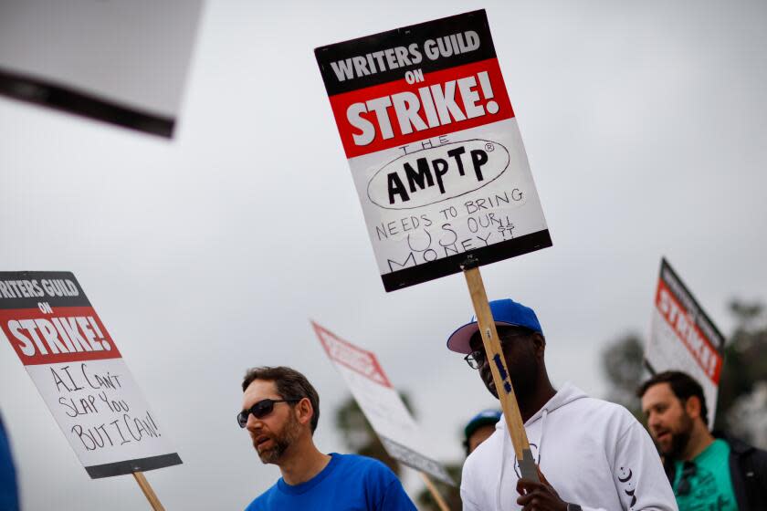 Studio City, CA - May 09: Supporters of the Writer's Guild of America strike, picket along Colfax Avenue, at Radford Studios Center, in Studio City, CA, Tuesday, May 9, 2023. (Jay L. Clendenin / Los Angeles Times)