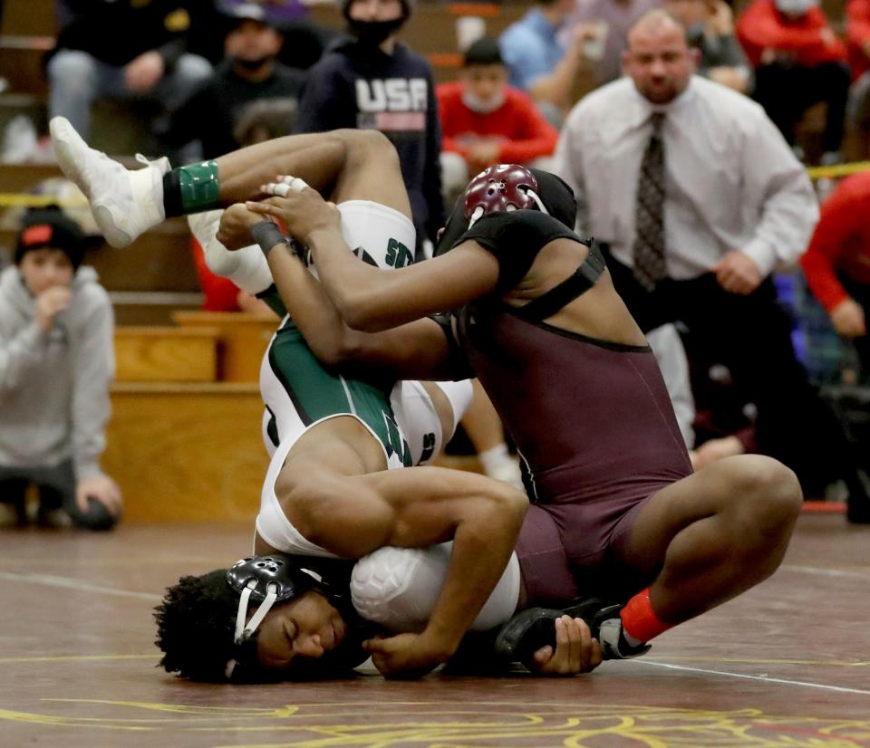 Ossining's Tristan Robinson-July (right) is the top seed at 160 pounds for the Westchester County championships.