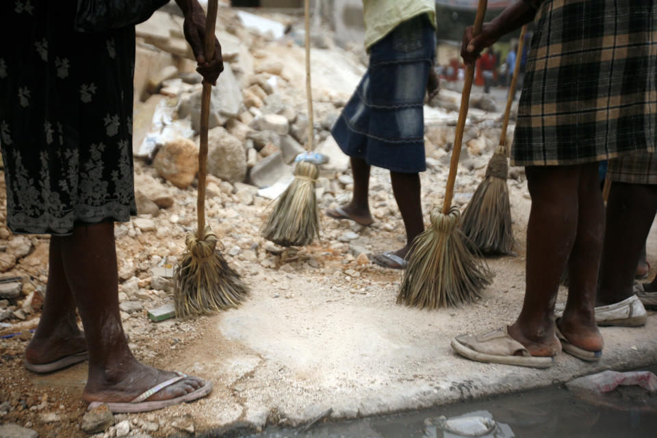 Women clean the rubble and streets of the Carrefour Feuille area of Port-au-Prince on Jan. 26, 2010, as part of a&nbsp;United Nations-supported&nbsp;"Cash for Work" program.