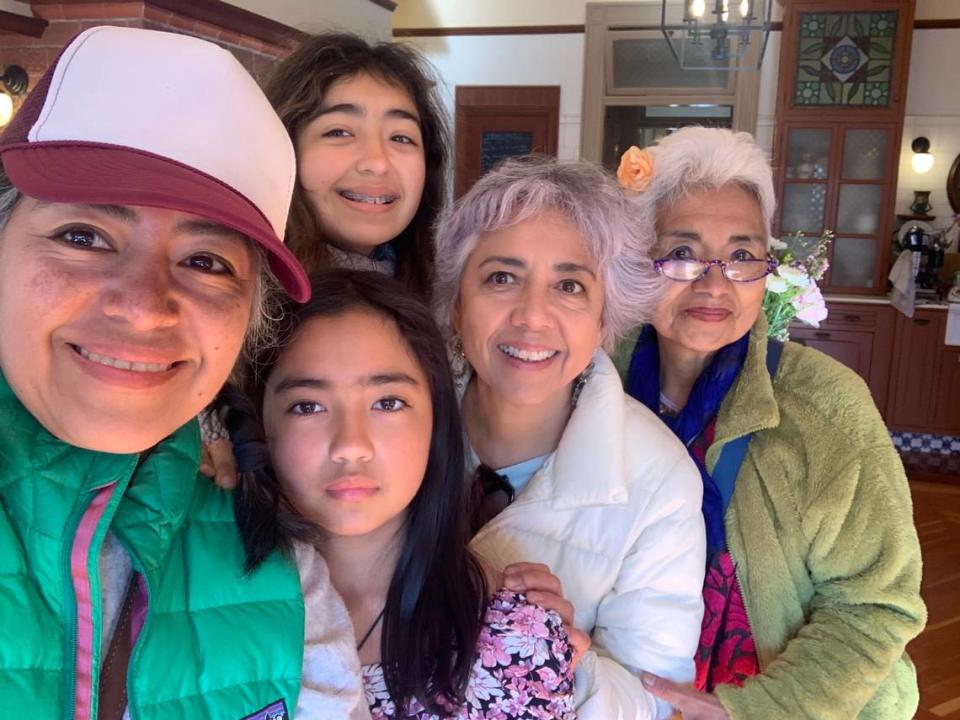 Claudia Cabrera Olsen is pictured with her sister Pilar Cabrera Arroyo, mother Mariana Emilia Cabrera Arroyo, and daughters Aria and Cielo.