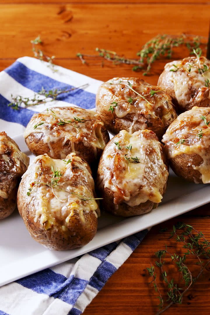 <p>These potatoes are KILLER. If you want to make 'em a meal, go for big russets. If you'd like to serve them as hors d'oeuvres, choose a smaller potato.</p><p>Get the <a href="https://www.delish.com/uk/cooking/recipes/a28924490/french-onion-baked-potatoes-recipe/" rel="nofollow noopener" target="_blank" data-ylk="slk:French Onion Baked Potatoes;elm:context_link;itc:0;sec:content-canvas" class="link ">French Onion Baked Potatoes</a> recipe.</p>