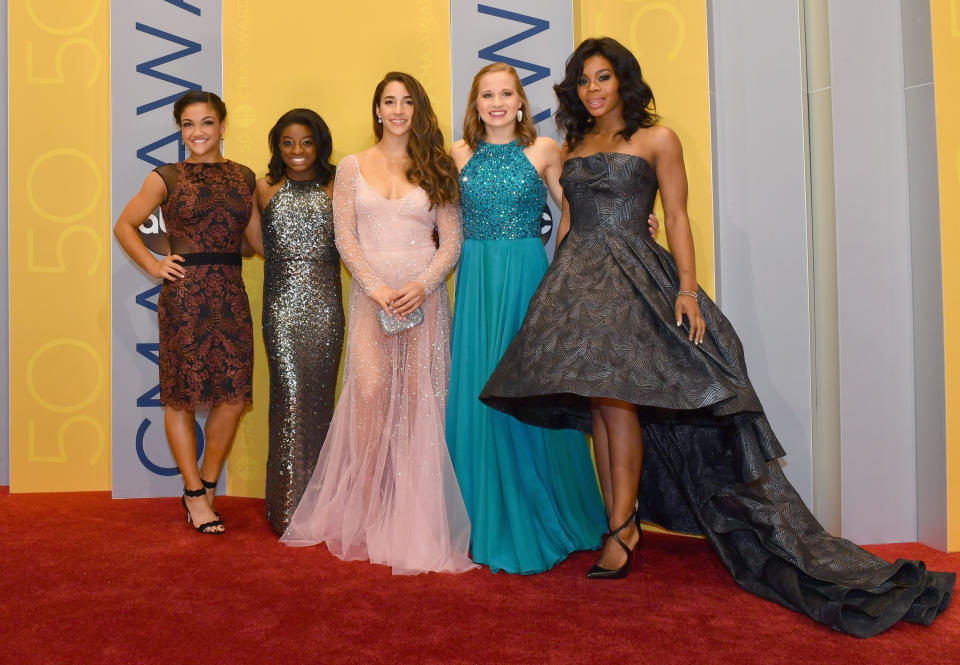 NASHVILLE, TN - NOVEMBER 02:  (L-R) Olympic gymnasts Laurie Hernandez, Simone Biles, Aly Raisman, Madison Kocian, and Gabby Douglas attend the 50th annual CMA Awards at the Bridgestone Arena on November 2, 2016 in Nashville, Tennessee.  (Photo by Jason Davis/FilmMagic)