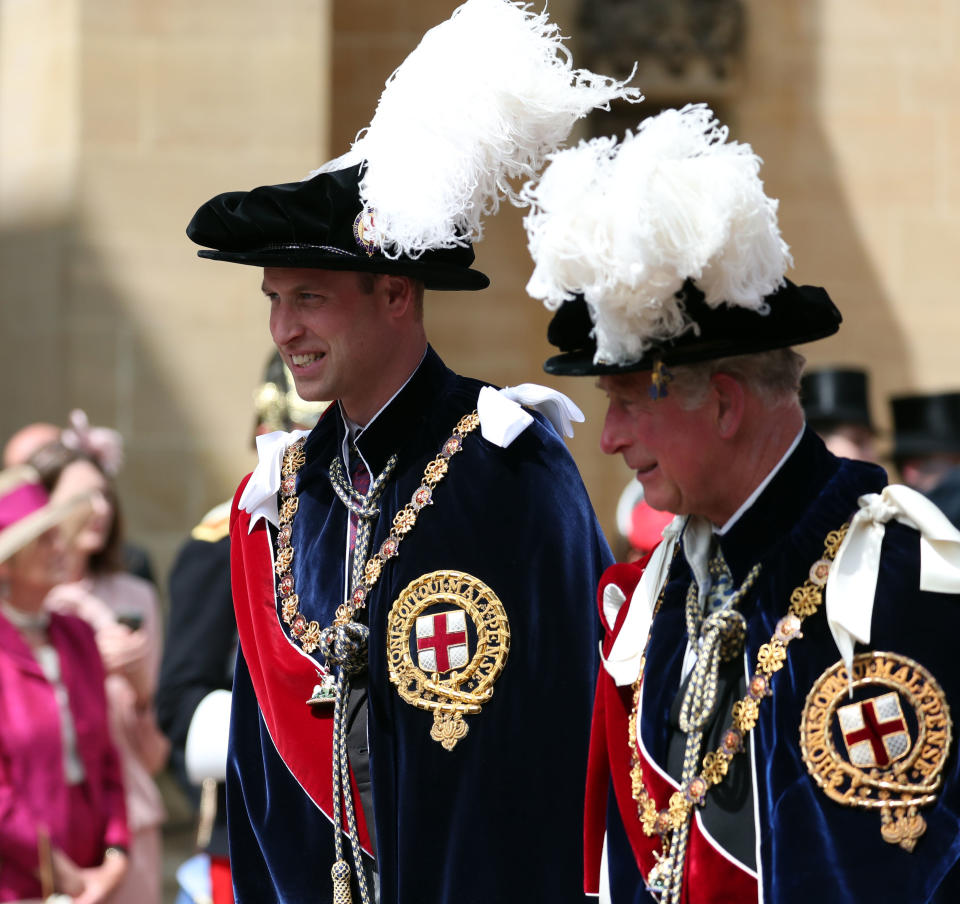 Prince William, Duke of Cambridge and Prince Charles, Prince of Wales leave the Order of the Garter Service at St George's Chapel in Windsor Castle 