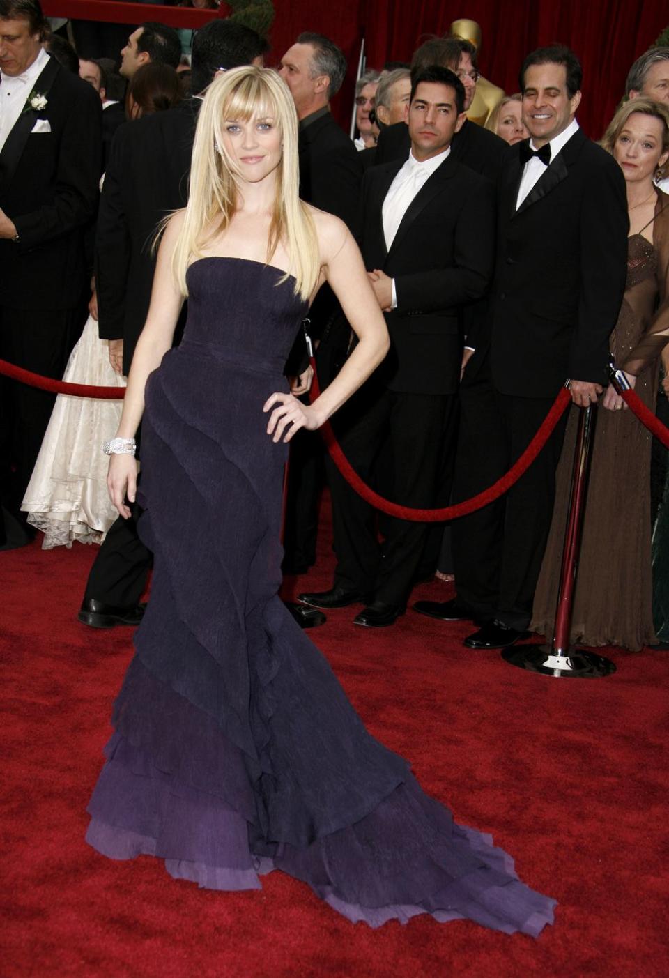 <p>Although Witherspoon began to go full-on glam at any red carpet event, she also showed that she liked to have fun with her gowns and outfits, usually opting for something with color or a fun design. At the 79th Annual Academy Awards, she looked like a star in this purple ombré gown. </p>