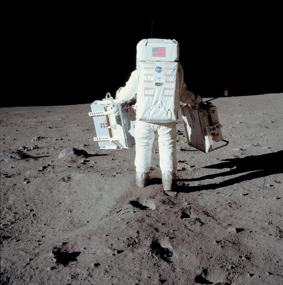 Apollo 11 space mission US astronaut Buzz Aldrin is seen conducting experiment on the moon's surface on a picture taken by Neil Armstrong (AFP/Getty Images)