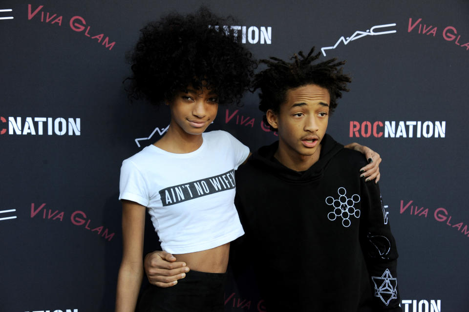 Willow Smith, left, and her brother Jaden Smith arrive at the Roc Nation 2014 Pre-Grammy Brunch Celebration on Saturday, Jan. 25, 2014, in Los Angeles. (Photo by Jordan Strauss/Invision/AP)