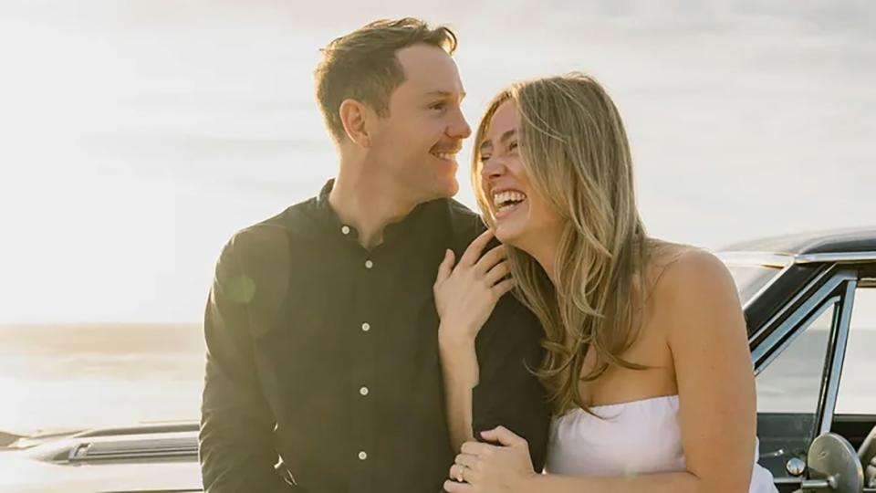 Carter Rhoad poses with his fiancée Natalie