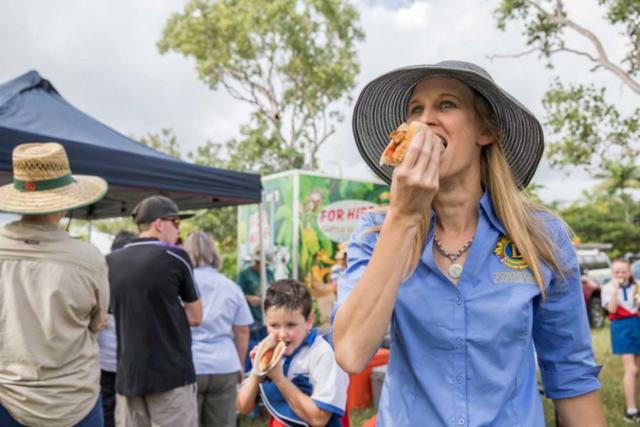 Community enjoy sausage sizzle from Lions Australia